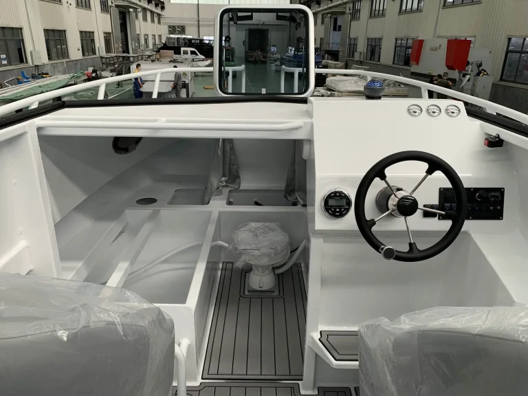 Helm wheel and dash with teak look flooring