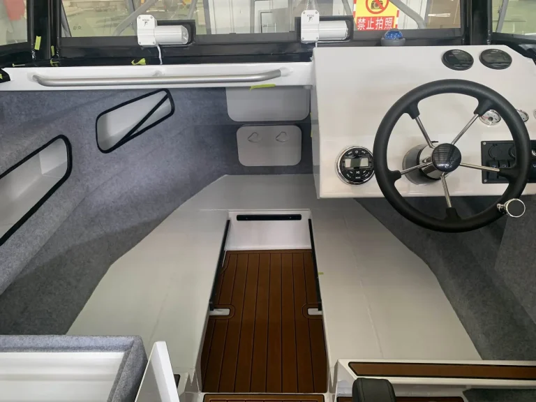 Helm wheel and dash with timber look flooring