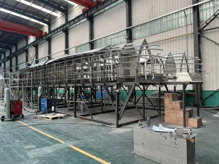 Hull framing and scaffolding in the fabrication shop