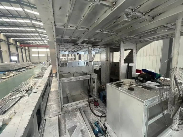 Interior fit out of a large plate aluminium vessel