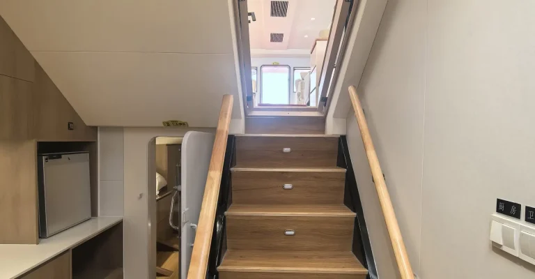 Interior stairway with timber treads on a passenger vessel
