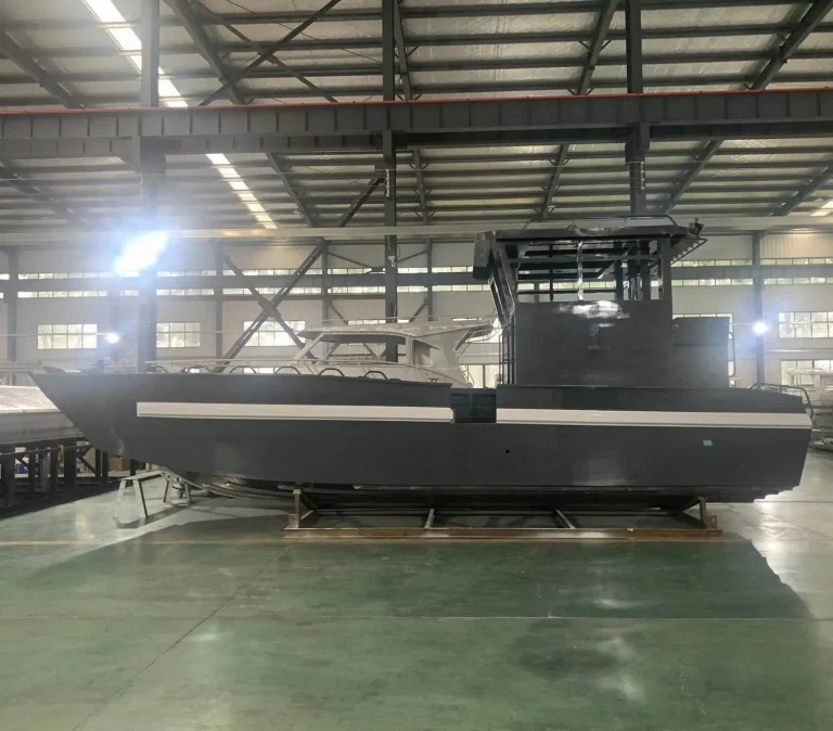 Large charcoal plate aluminium hull under construction in the factory