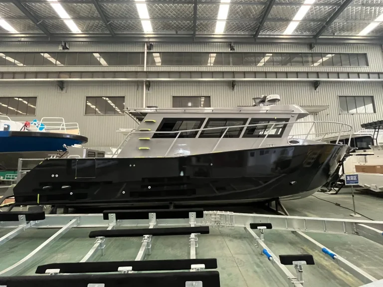 Long black plate aluminium hull in the factory