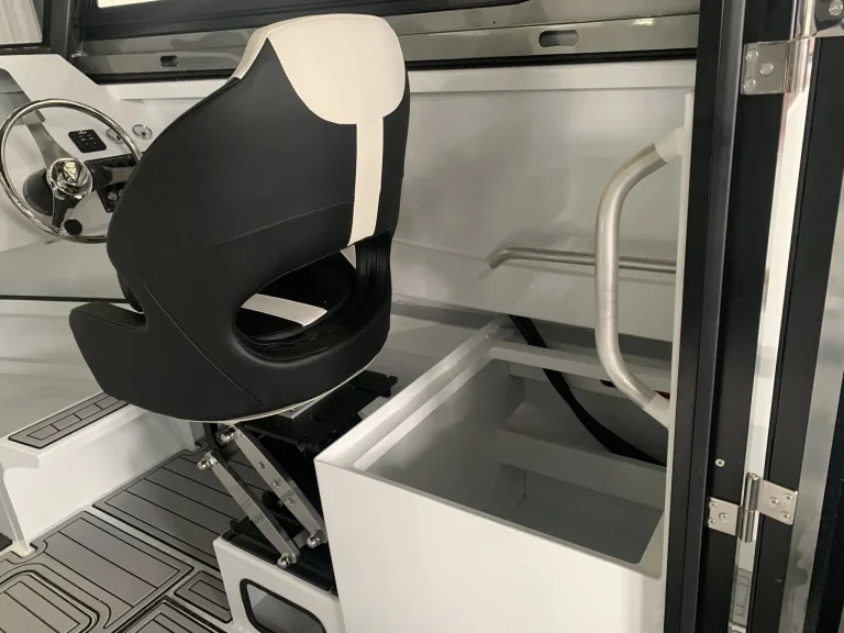 Moulded helm seat detail inside a plate aluminium boat