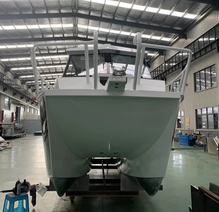 Pale green plate aluminium hull on stands in the factory