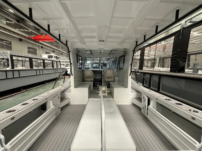 Passenger cabin walkway with checker plate flooring