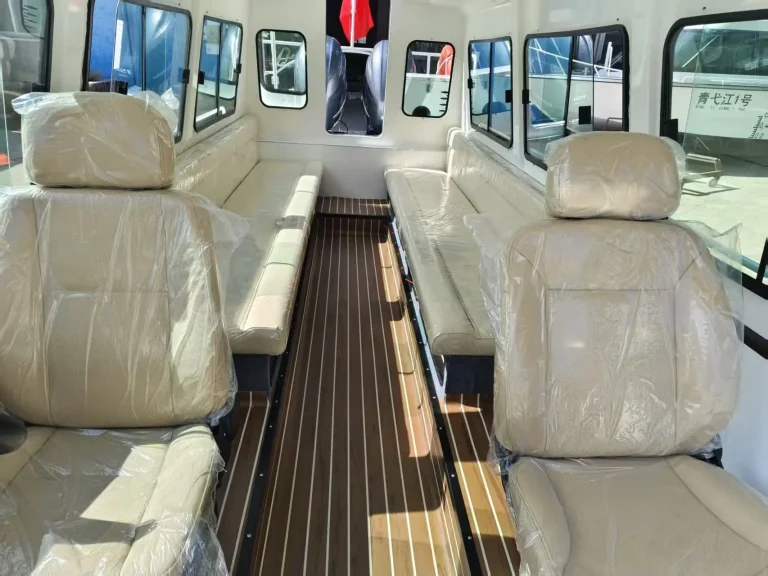 Passenger cabin with cream seats and teak look floor