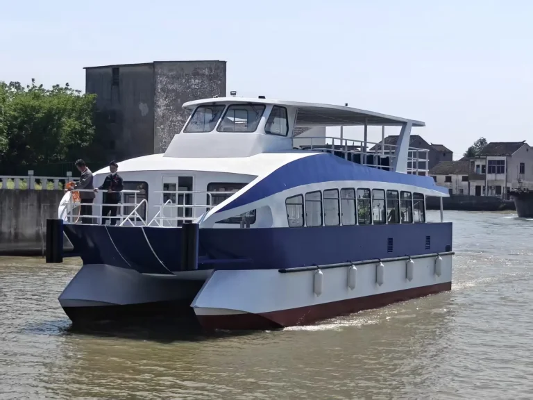 Passenger ferry with upper deck at a landing