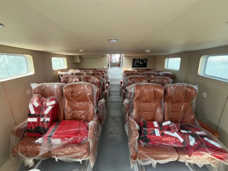 Passenger seating in wrap inside a ferry cabin