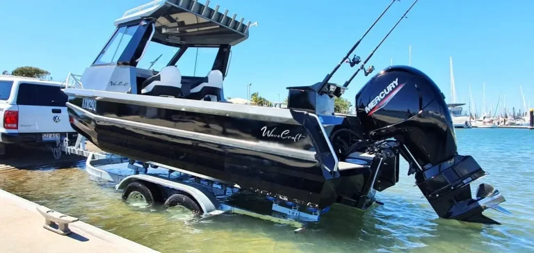 Plate aluminium boat on a trailer at the boat ramp