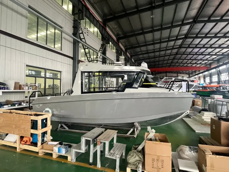 Plate aluminium boat under fit out in the factory