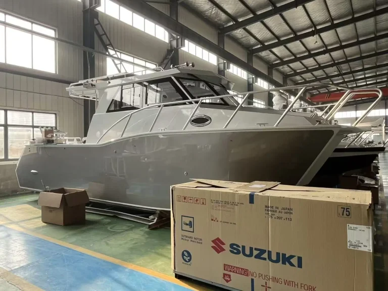 Plate aluminium boat with Suzuki outboards ready to rig