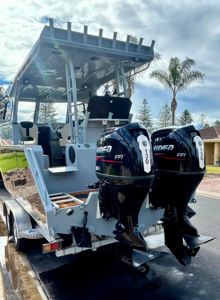Plate aluminium centre console with twin outboards on a trailer