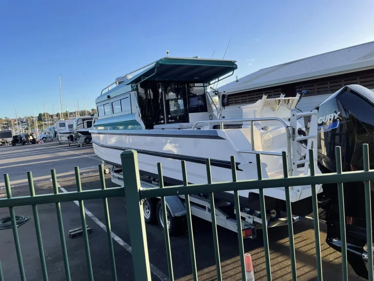 Plate aluminium charter boat parked at the marina