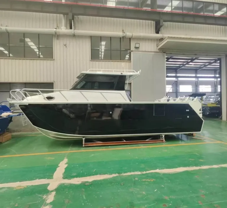 Plate aluminium hull with black topsides in the factory