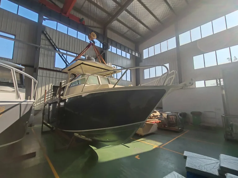 Plate aluminium hull with cabin under fit out