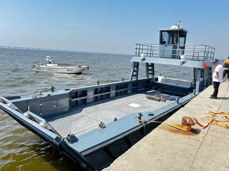 Plate aluminium landing craft alongside a wharf
