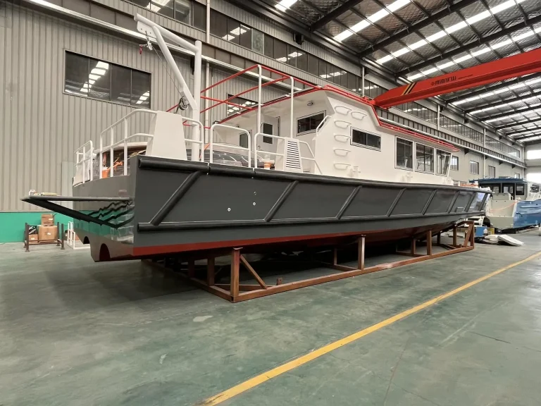 Plate aluminium work boat hull on the factory floor
