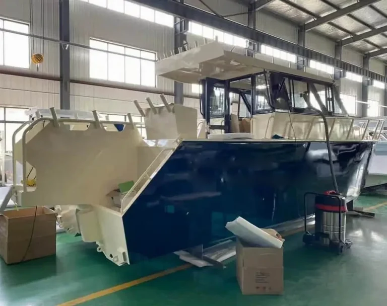 Plate aluminium work boat with bow ramp under fit-out in the factory