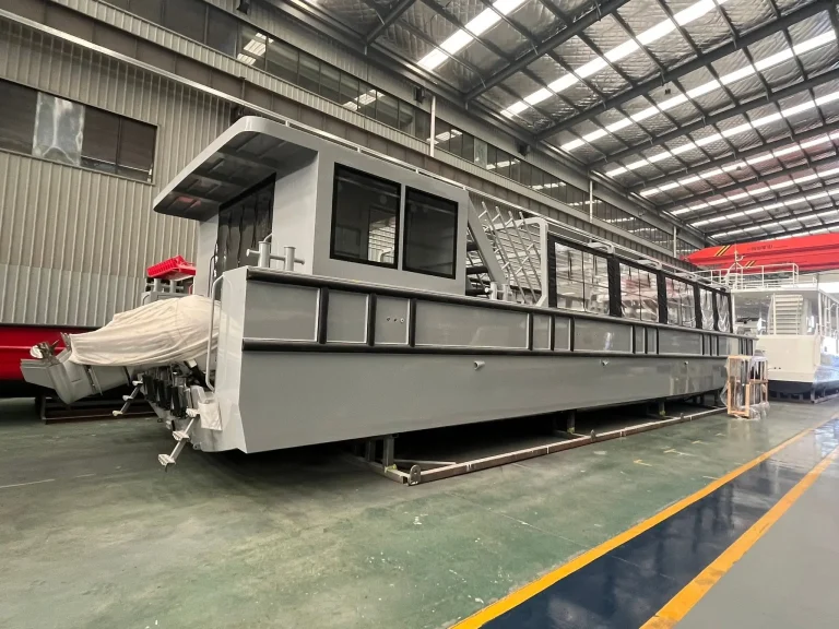 Plate aluminium work boats lined up in the factory