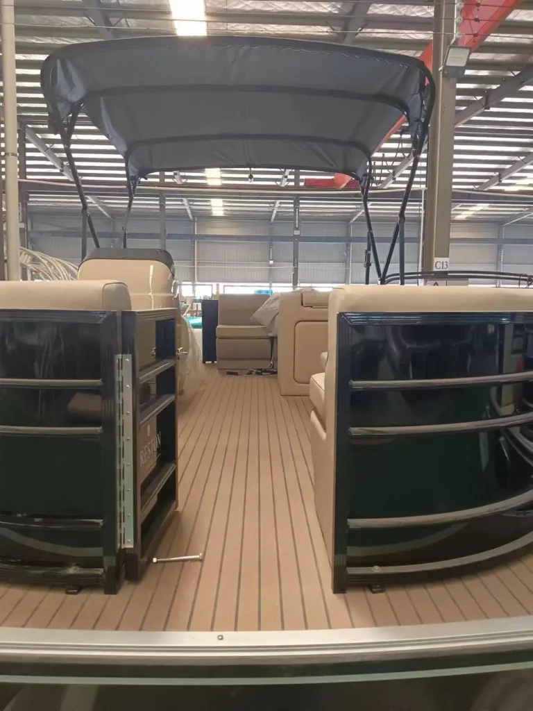 Pontoon boat deck with bimini and teak look flooring