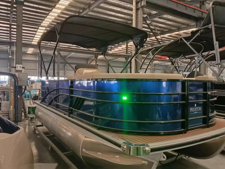 Pontoon boat with green LED accent lighting