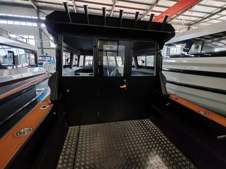 Rear deck and cabin doors with checker plate floor