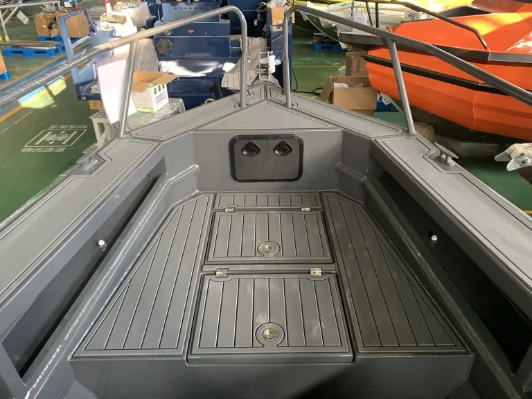 Rear deck with grey teak look flooring and side rails
