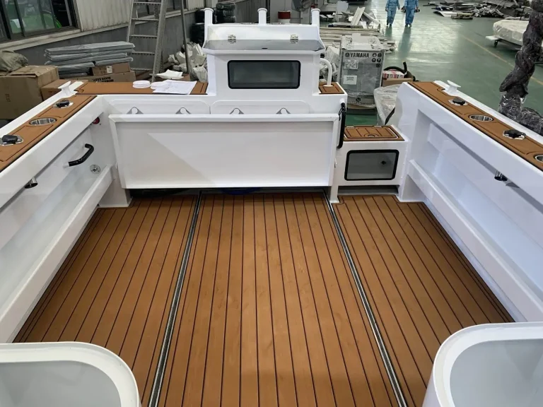 Rear deck with teak look flooring and bait station