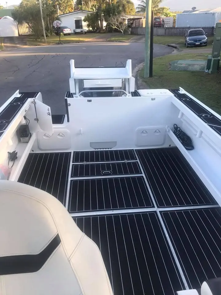 Rear deck with teak look flooring and boarding platform