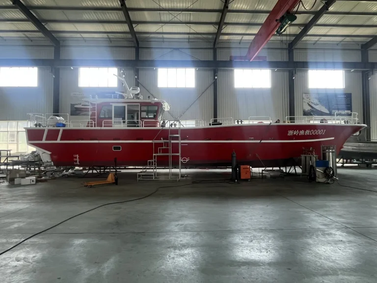 Red plate aluminium work boat in the factory