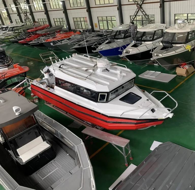 Rows of aluminium boats under construction in the factory