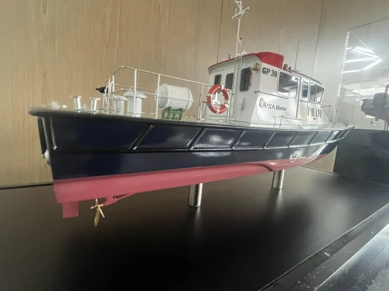 Scale model of a black hulled pilot vessel