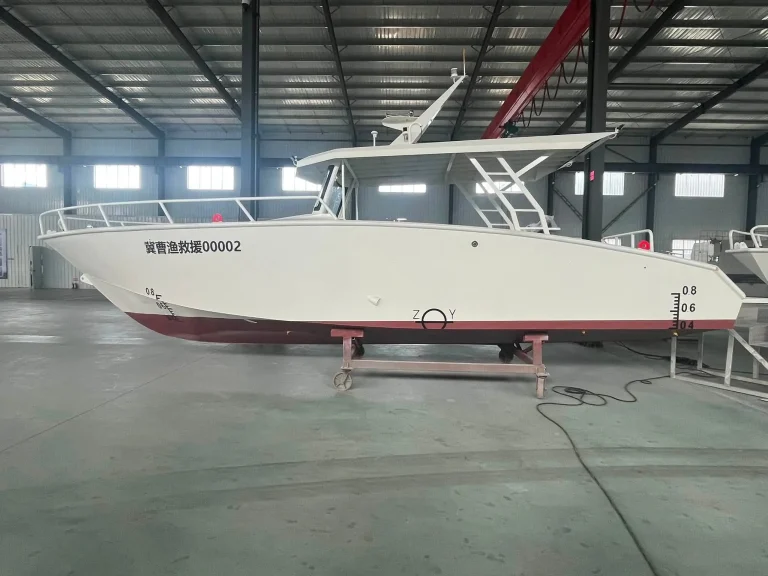 Side view of a white plate aluminium work boat