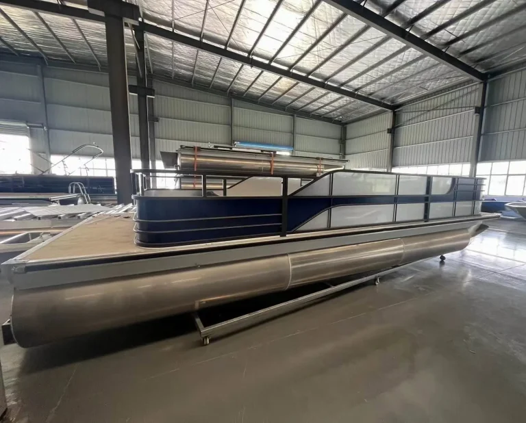 Side view of an aluminium pontoon boat with railings