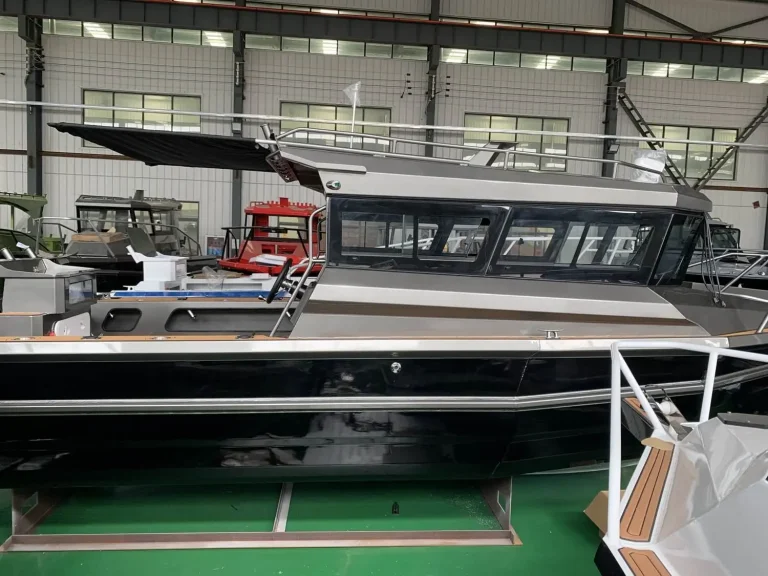 Side view of an enclosed cabin cruiser with wraparound windows