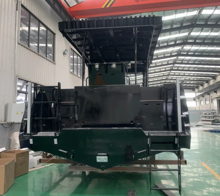 Stern and outboard bracket of a black hull in the factory