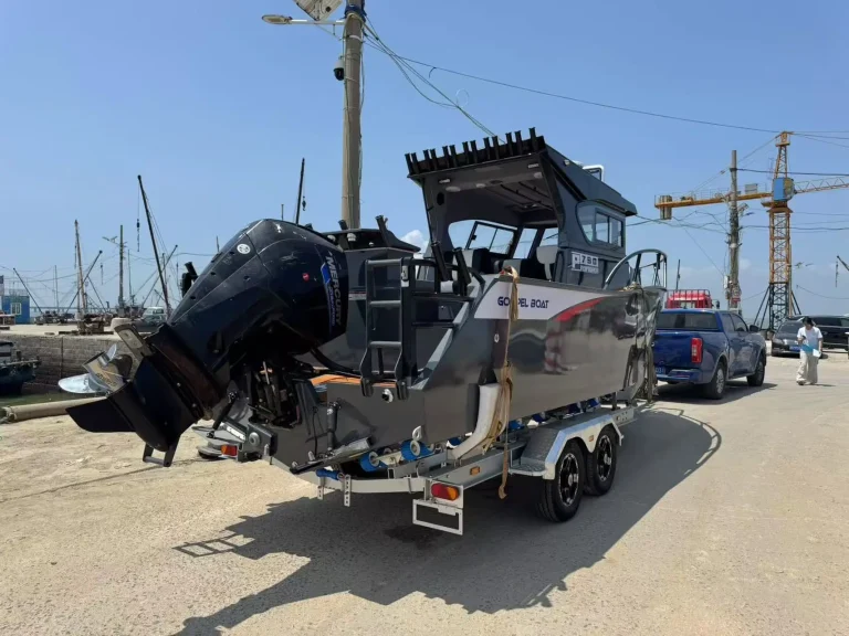 Stern and outboards of a patrol boat on a trailer