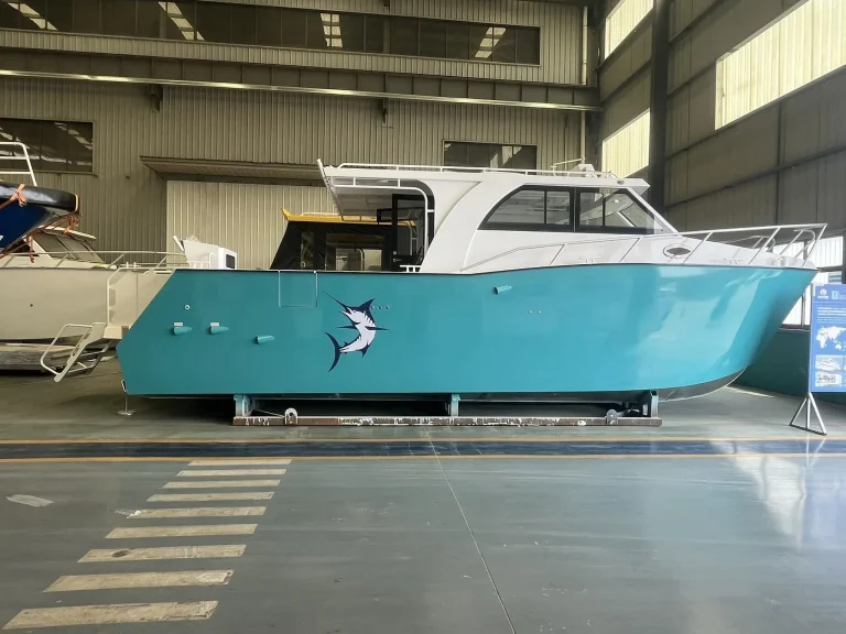Teal plate aluminium boat in the finishing bay