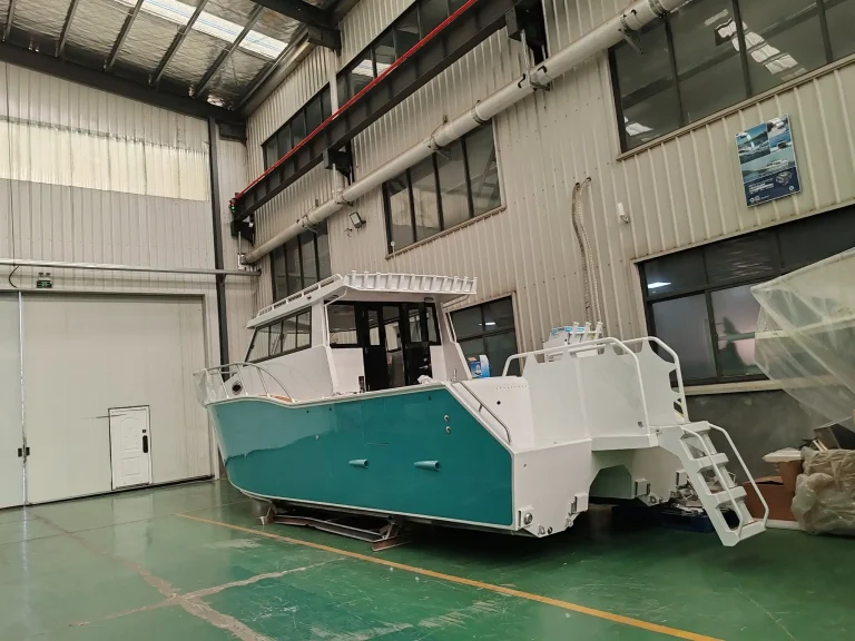 Teal plate aluminium hull on the factory floor