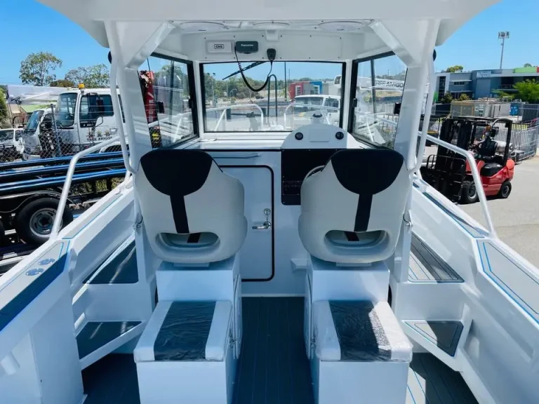 Twin bolster seats and console under a hardtop
