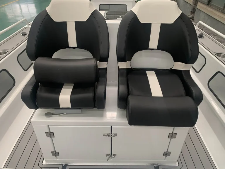 Twin bolster seats over a console with storage