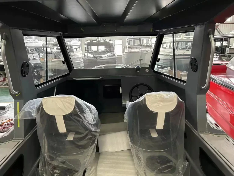 Twin wrapped helm seats under a hardtop