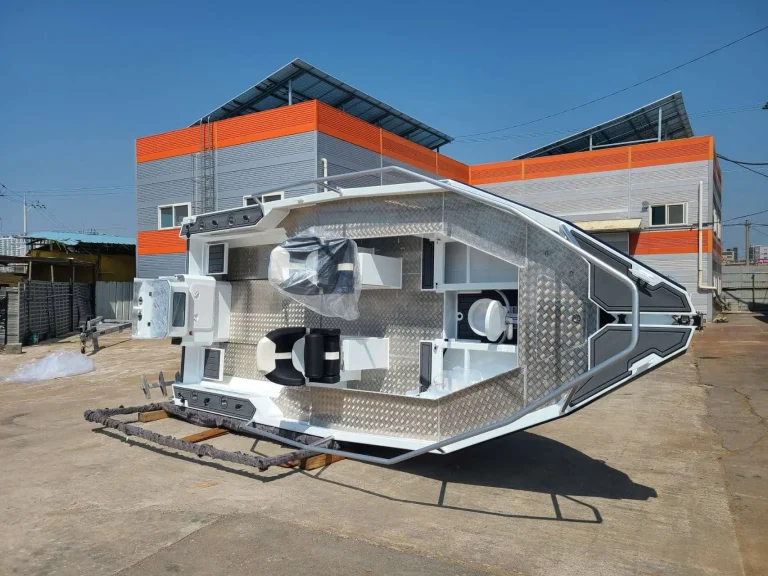 Unpainted plate aluminium hull on a trailer