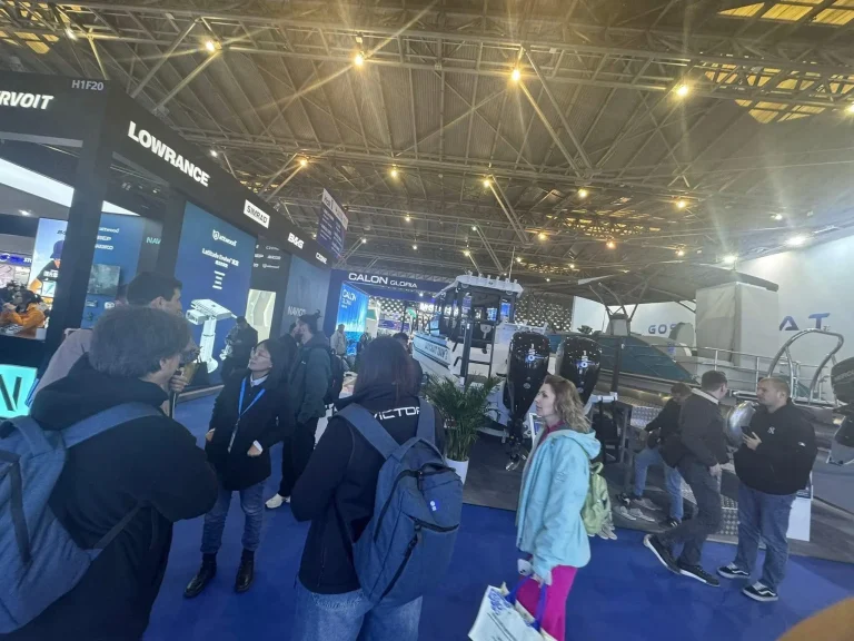 Visitors walking the aisles at a boat show