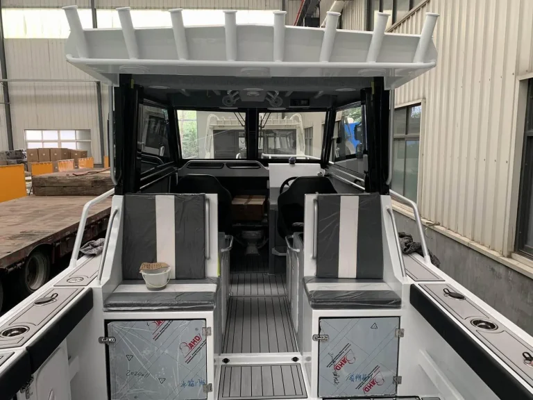 Wheelhouse interior with bench seats and wide windows