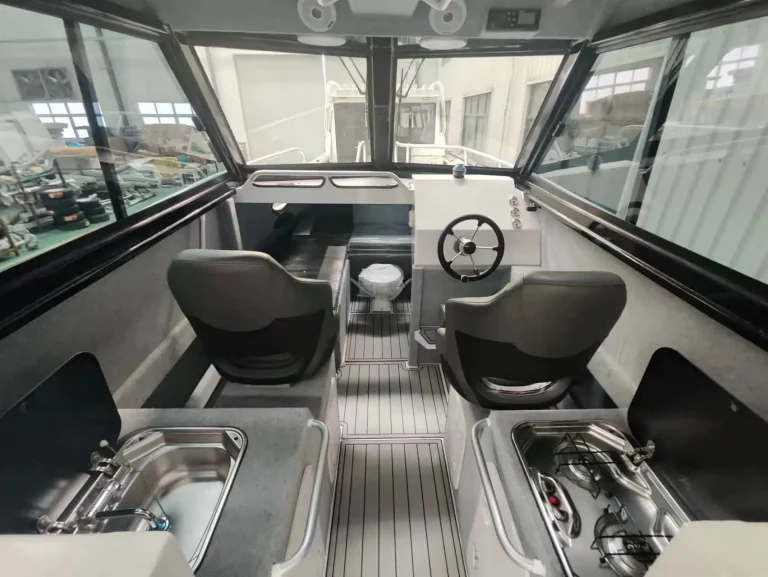 Wheelhouse with helm seats and stainless galley