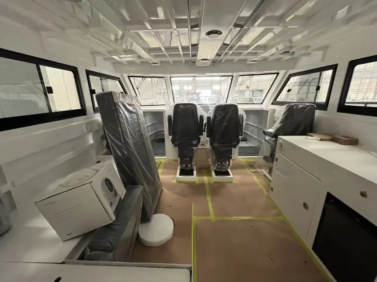 Wheelhouse with shock mitigating seats and consoles