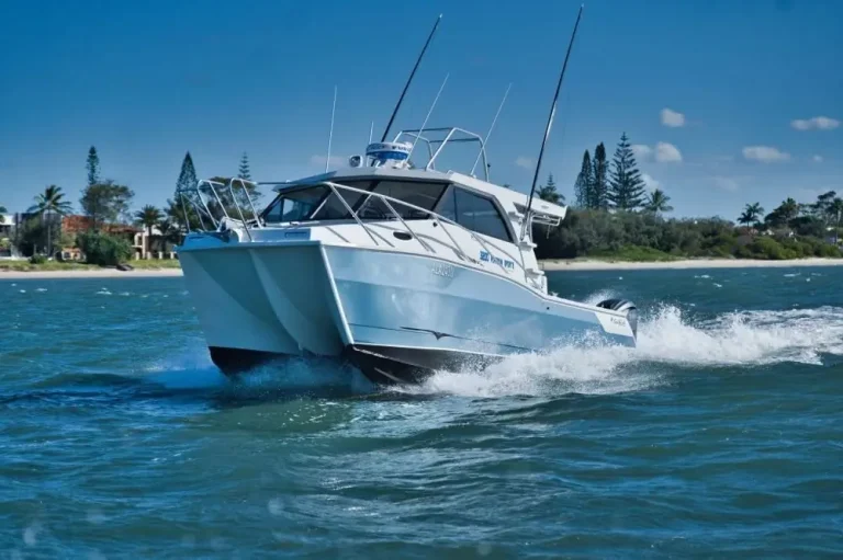 White plate aluminium hardtop boat running at speed