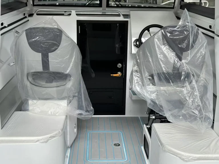 Wrapped helm seat and console before delivery